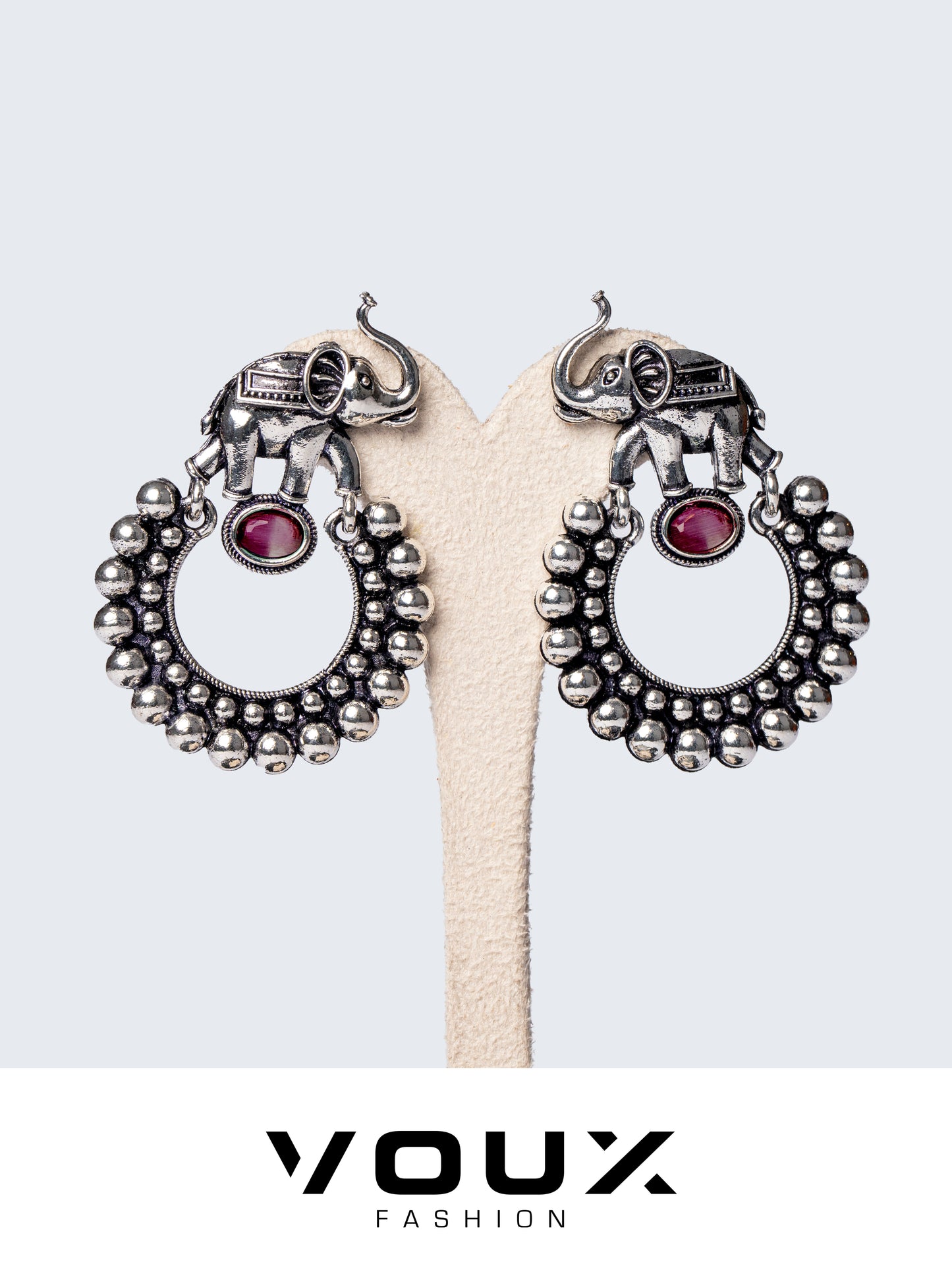 black metal round earing with wine red stone froth angle 